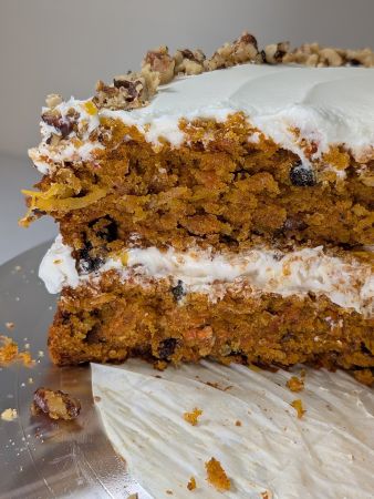 closeup of cut naked vegan carrot cake showing uniform texture