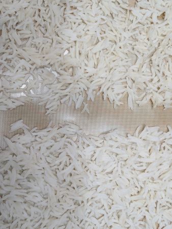 unrinsed rice, top; rinsed, bottom (both from a plastic bag)
