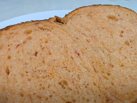 close-up of a slice of Panera's Tomato Basil Bread